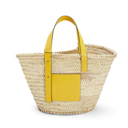 Basket bag in palm leaf and leather